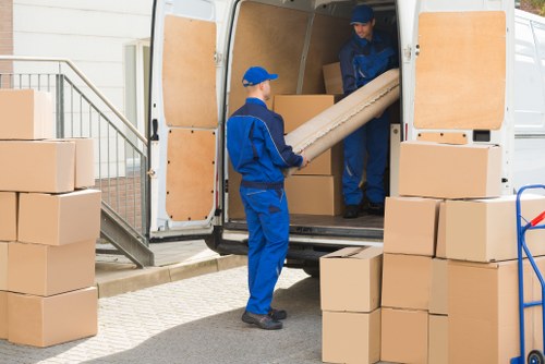 Removal team helping with a Hackney home move on a residential street