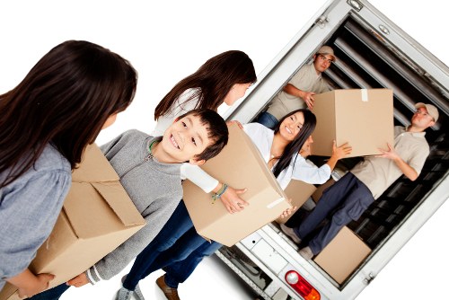 Removal van and boxes prepared for a move in Hackney