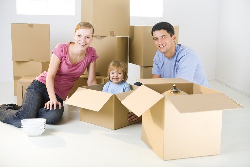 Van and recyclable household items being sorted for eco-friendly removals in Hackney