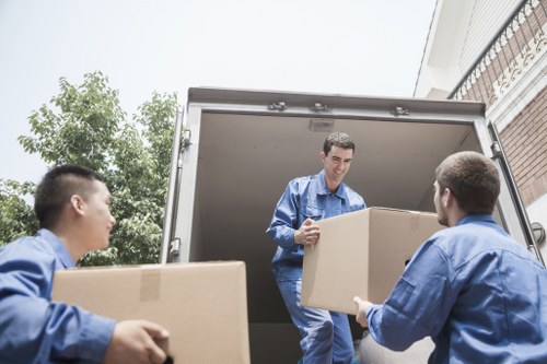 Careful furniture loading for a home move in Hackney