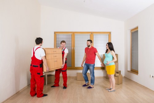 Loading furniture and boxes into a van in Hackney
