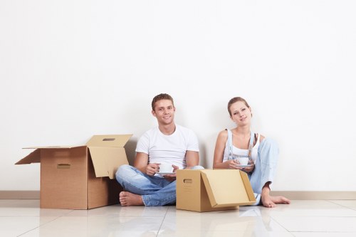 Moving boxes and furniture loaded into a removal truck